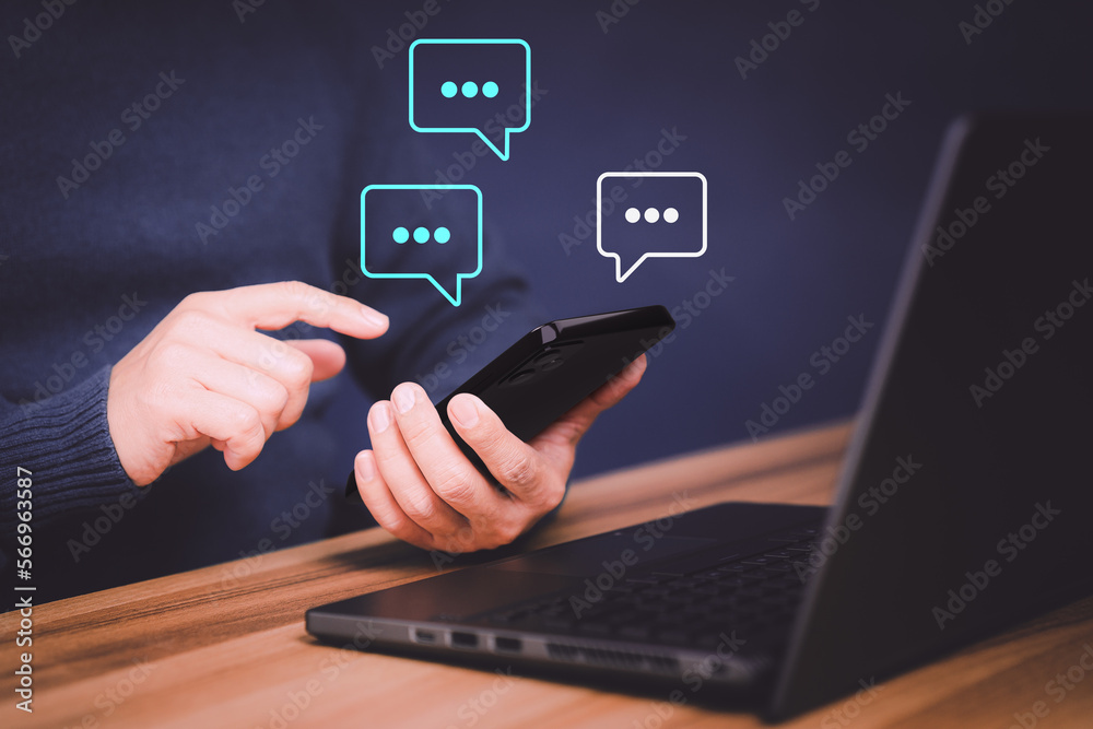 Poster Young man hand using a smartphone typing live chat chatting on application communication digital web and social network concept. Social media application chat box on mobile phone.