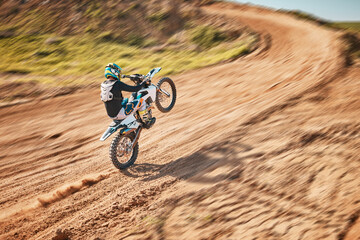 Fototapeta na wymiar Motorcycle athlete, dirtbike and motion blur for sports on sand trail for freedom. Driver, cycling and offroad competition, motorbike performance and adventure course for fast action, speed and risk