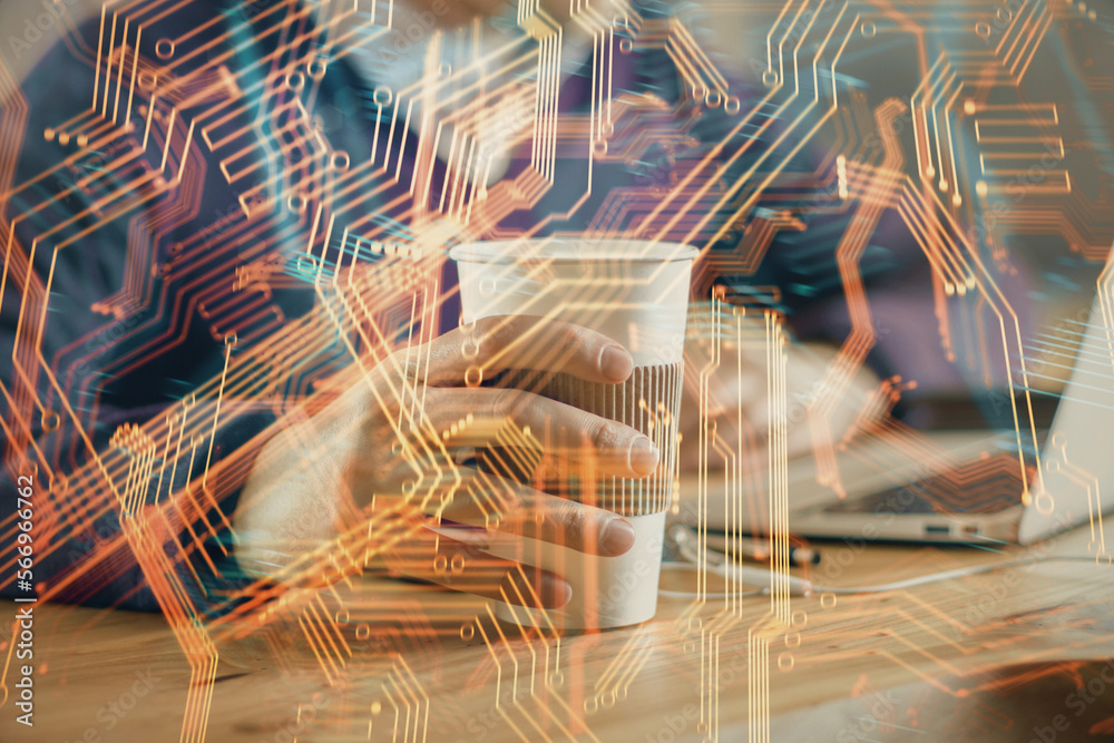 Aufkleber Technology theme hologram with man working on computer on background. High tech concept. Multi exposure.