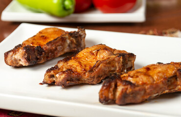 Caucasian shashlik plate with grilled meat .  pork bbq