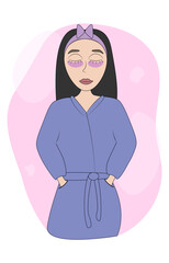 girl in bath robe making skin care