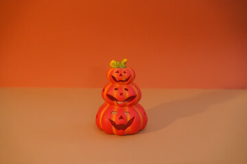 Tower of pumpkins isolated background.