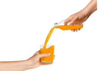 Two hands. Holding a bottle and a glass of freshly squeezed orange juice. Juice pours from a bottle into a glass. Isolated on white background.