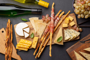 Antipasto board with various cheese and snacks