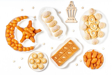 Traditional middle eastern sweets assortment with ramadan decor . Ramadan desserts maamoul, awameh...