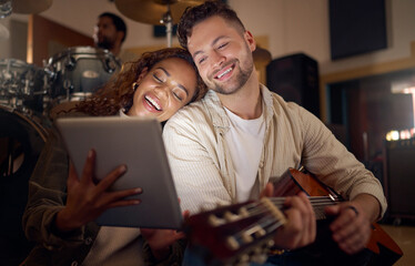 Guitar, music and couple with digital tablet for online lyrics or strumming notes in recording...