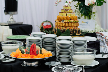 Dessert Corner with Fresh Fruits with unique shapes and Snacks Appetizer served by Indonesia Catering Table Decoration