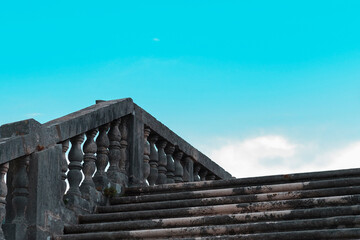 Fototapeta na wymiar ancient stone stairs goe to blue sky, old european style in croatia dubrovnik kolomac town