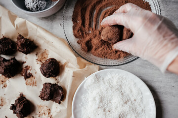 Homemade cream cheese and dark chocolate truffles rolled in cocoa powder