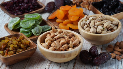 Assorted dry fruits: Dry plum, kiwi, raisins, nuts, pistachios. Tu BiShvat  a Jewish holiday concept