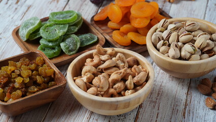 Assorted dry fruits: Dry plum, kiwi, raisins, nuts, pistachios. Tu BiShvat  a Jewish holiday concept