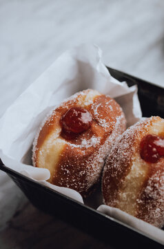 Italian donuts with jam, bombolone