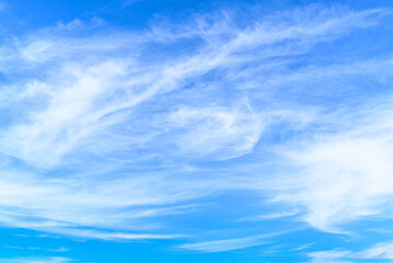 White clouds in a bright blue sky. The beauty of the nature