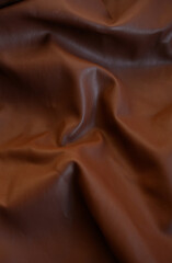 brown eco leather. Artificial leather. Artificial leather. Leatherette background.