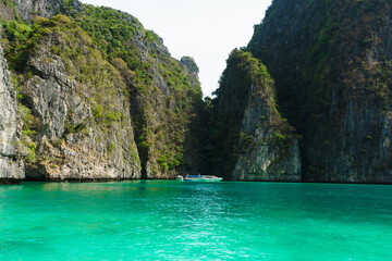 Naklejka na ściany i meble Sea lagoon and green rock in Thailand. Traveling and vacation concept.