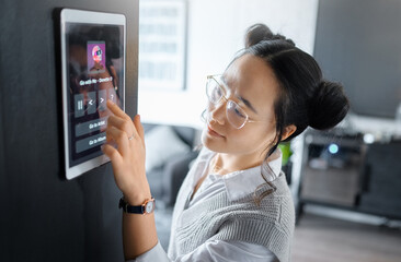 Music, tablet and Asian woman with digital system in home, apartment and living room. Technology,...
