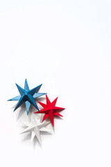 President's day.American handmade stars on white background.President's day background, holiday card. DIY festive flat lay. presidential day zero waste, paper, eco postcard.