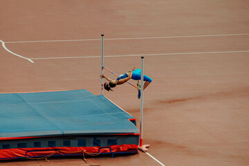 high jump female athlete attempt at competition