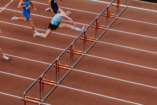 110 meter hurdles race men athletes athletics competition