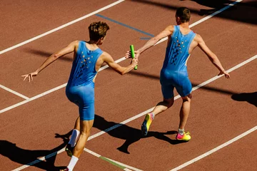 Tuinposter male relay race running for track and field competition © sports photos