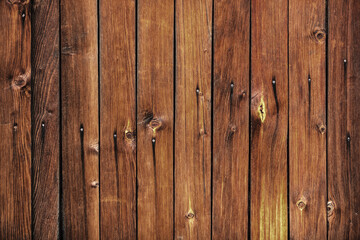 Wood texture. Wooden plank grain background. Striped timber desk closeup. Old table or floor. Brown boards.