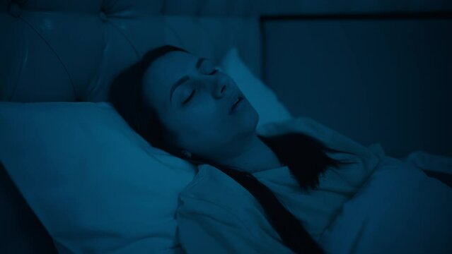 Woman sleeping with open mouth