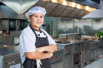 portrait senior asian chef. Cooking class. culinary classroom. cooking school.