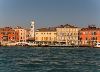 colorful buildings in Venice, Italy seen from the lagoon