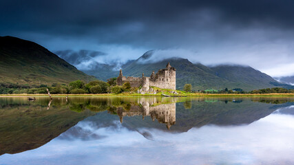 Fototapeta na wymiar Kilchurn Castle in Scotland landscape with still lake