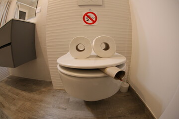 Toilet with no smoking sign 