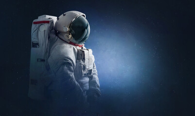 Astronaut in space. Spaceman in Universe with stars. Sci-fi surreal wallpaper. Deep space. Elements of this image furnished by NASA