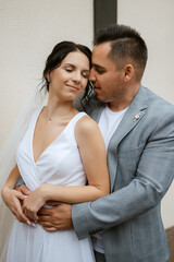 Fototapeta premium young couple the groom in and the bride on a walk