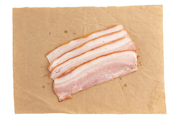macro closeup flat top lay of fresh uncooked pork belly fat bacon meat, nutritious food on brown paper wrap, pieces of fresh bacon on parchment paper isolated on white background