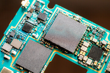 Smartphone PCB and chips super close-up - very small SMD elements