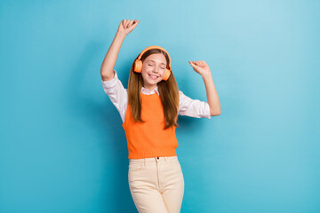 Photo of excited carefree person closed eyes dancing enjoy playlist isolated on blue color background