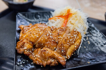 Close up shot of Japanese style grilled chicken leg