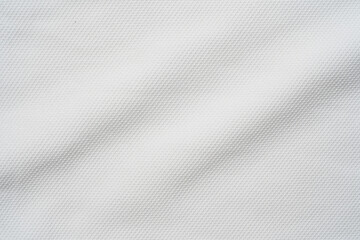 Naklejka na ściany i meble Closeup elegant crumpled of white silk fabric cloth background and texture. Luxury background design.