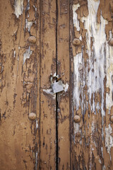 Old wooden door with padlock