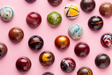 Assortment of painted handcrafted chocolate bonbons. Delicious dessert