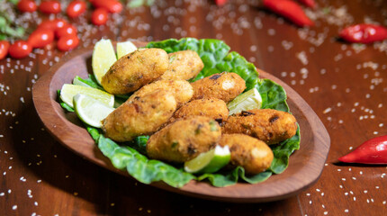 Fototapeta premium Fried ball of cod (bolinho de bacalhau)