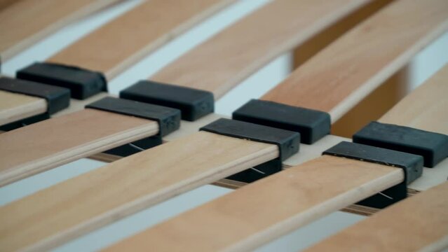 Demonstration Of An Orthopedic Wooden Double Bed frame on slats