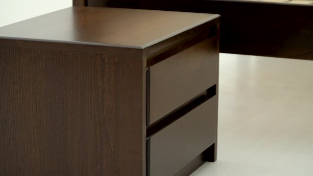 Demonstration Of An Orthopedic Wooden Double Bed frame on slats. Bedside table