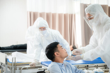 Obraz premium coronavirus disease medical health, care concept, doctor and nurse person wearing face mask and protection suit at hospital, covid-19 health care medicine and flu epidemic pandemic infection clinic