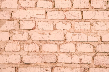 Old brick wall in warm color as background.
