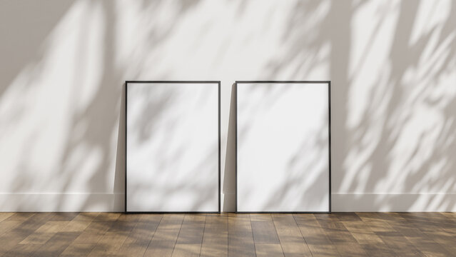 Frame poster mockup on wooden floor with white wall and sunlight shadow overlay