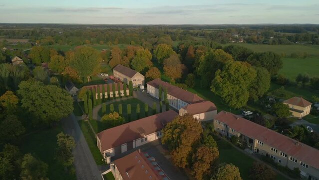 german Classicist castle in village of Paretz. Majestic aerial view flight drone