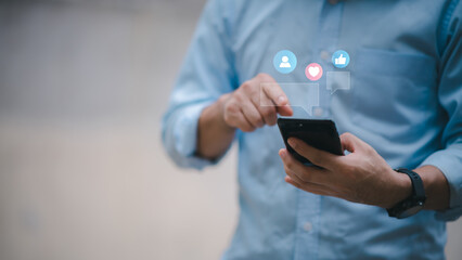 Man using smart phone. The concept of living on vacation and playing social media. Social Distancing ,Working From Home concept.Social media and digital online concept.