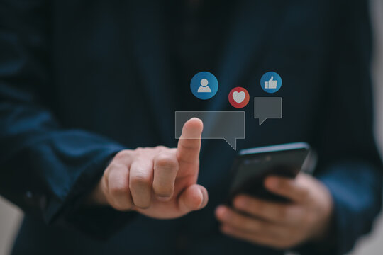 Man using smart phone. The concept of living on vacation and playing social media. Social Distancing ,Working From Home concept.Social media and digital online concept.