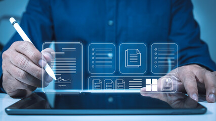 Electronic signature concept and paperless office concept. Businessman using pen to sign electronic document on digital document on virtual screen Electronic Signing Technology and Document Management