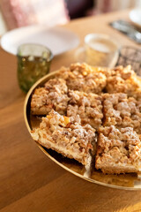 Apple Pie Pastry with a crumble crust in a rustical modern living room.